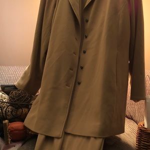 Tan woman pant suit . Size 24. Need sold by 11/10